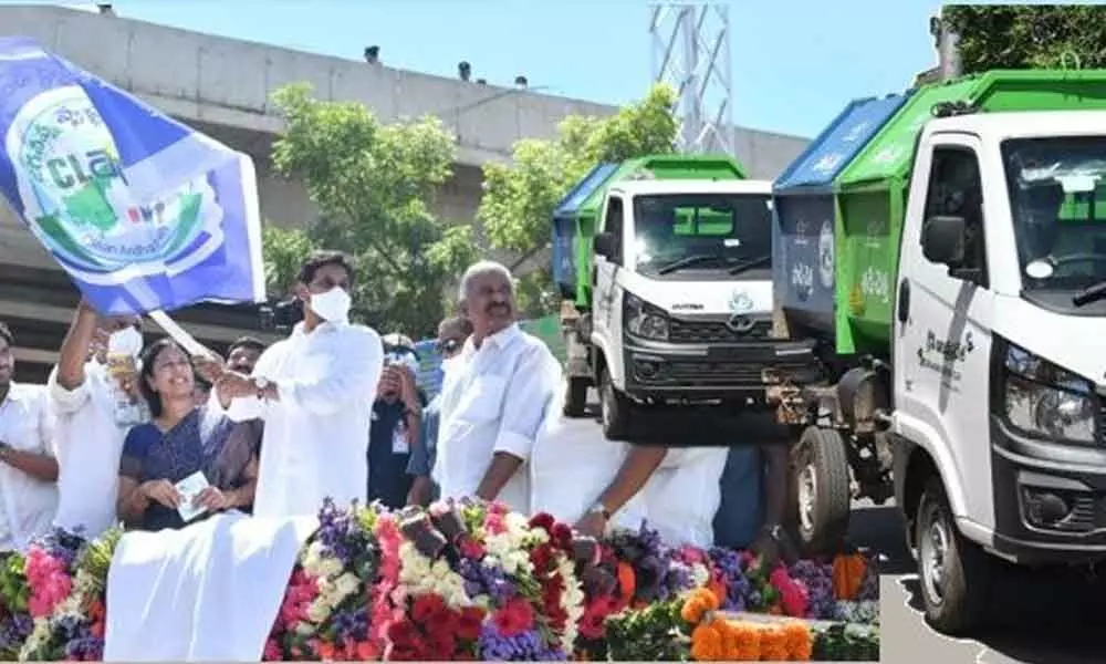 Chief Minister Y S Jagan Mohan Reddy launching the CLAP initiative by flagging off 2,600 garbage collection vehicles in Vijayawada