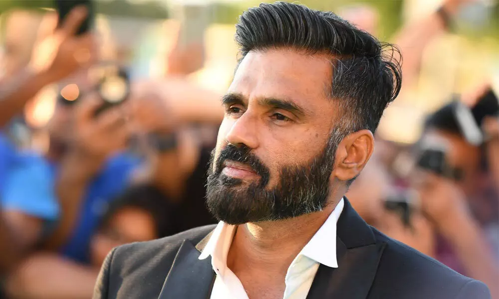 Suniel Shetty launches mobile spittoons to curb bad habit