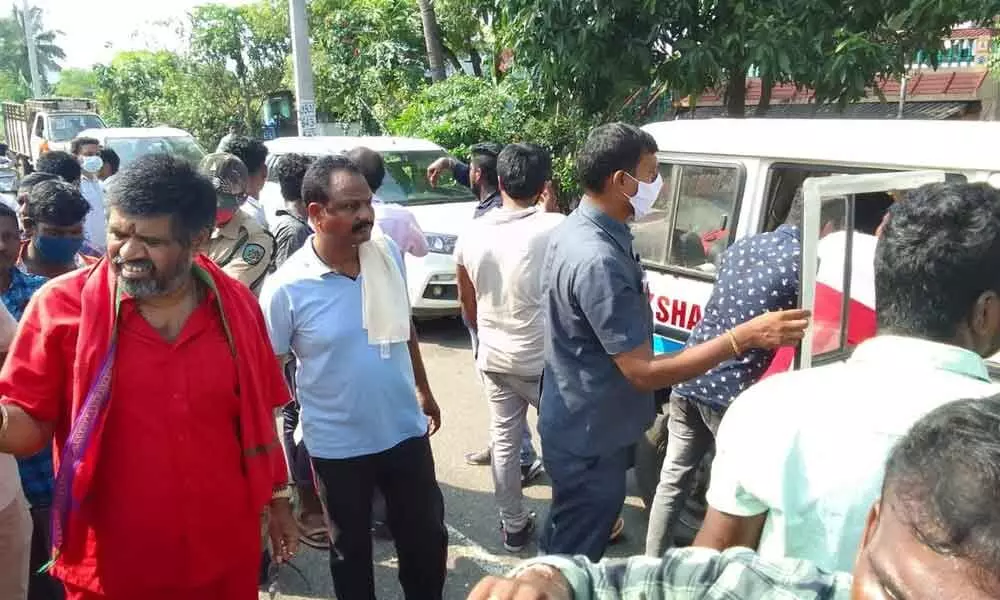 Tourism Minister M Srinivasa Rao at the accident spot at Sabbavaram mandal in Visakhapatnam on Sunday