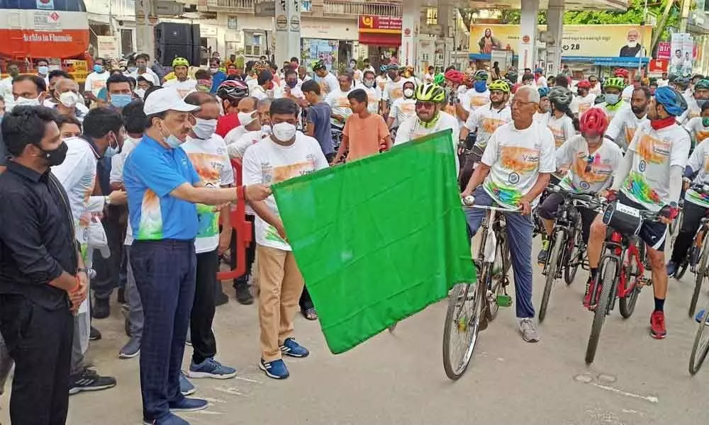 Special Chief Secretary Rajath Bhargava flagging off a cycle rally in Vijayawada on Sunday