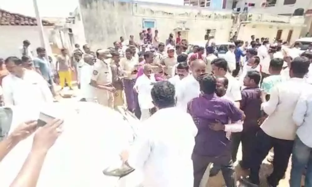 TRS MLA chased away by villagers at Shamshabad for non-fulfilment of promise of patta passbooks