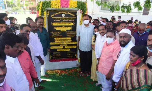 MLA Bhumana Karunakar Reddy unveiling the plaque marking the inauguration of the newly built CC road near SGS College in Tirupati on Sunday.