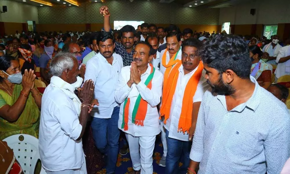 BJP candidate Eatala Rajender greets the people at an election meeting at Jammikunta on Monday