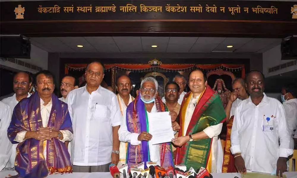 Chennai-based entrepreneur Sekhar Reddy takes charge as TTD LAC Chairman at a function held in the city on Monday. TTD Chairman Y V Subba Reddy handing over the order appointing him as LAC (Local Advisory Committee) chairman and addressing the gathering