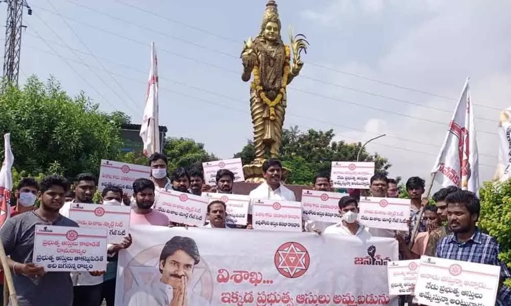 Jana Sena Party leaders staging a protest at the Telugu Talli statue in Visakhapatnam on Monday.