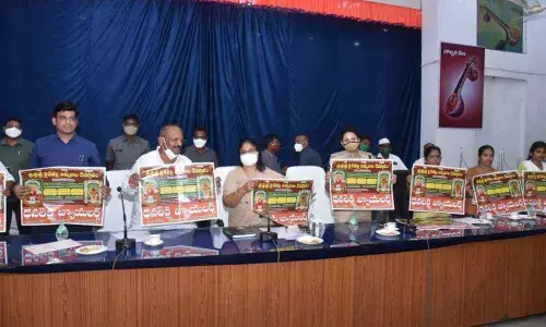 Collector A Suryakumari, SP M Deepika, and others release a poster on Pyditalli Sirimanotsav festival in Vizianagaram on Tuesday