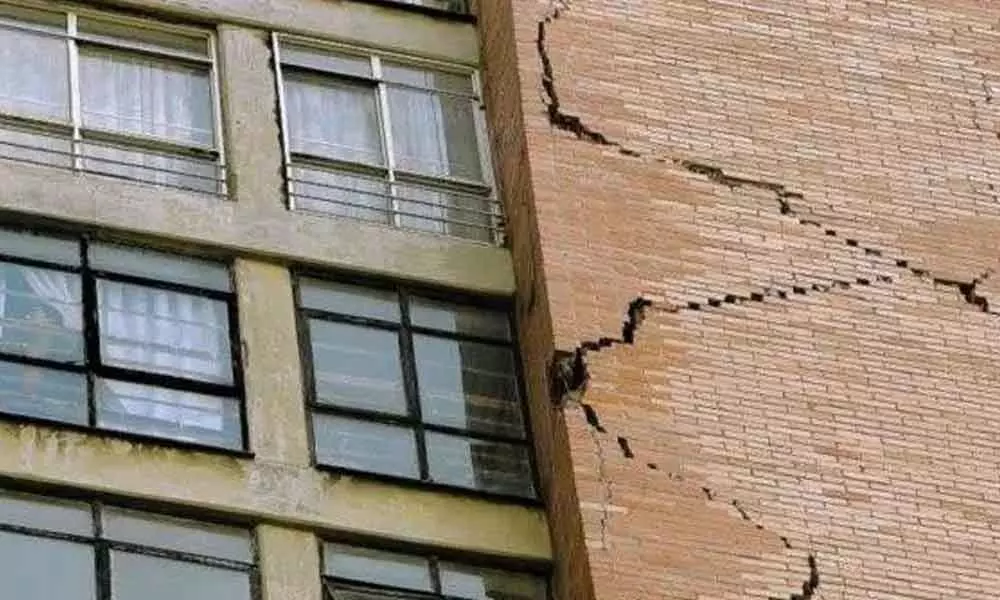 Building develops cracks, residents evacuated