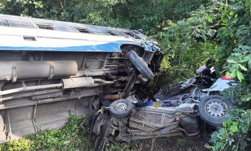 The RTC bus and car that fell into a ravine on the outskirts of Eklaspur village on Wednesday