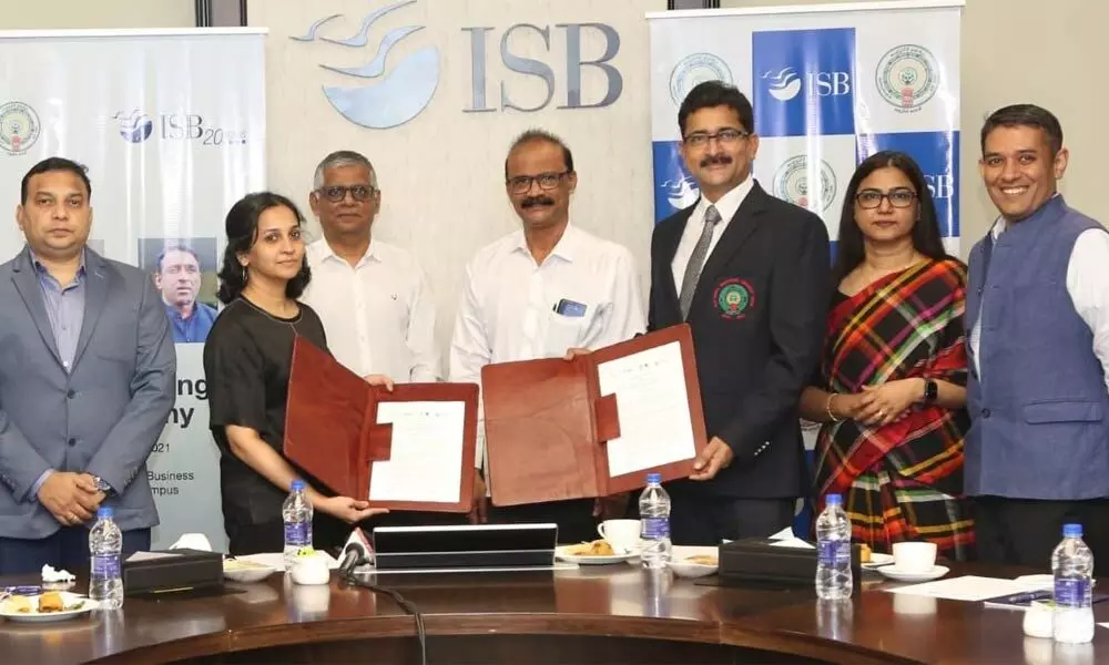 ISB Deputy Dean Deepa Mani exchanging  an MoU with the MD of APSSDC  N Bangar Raju, on the ISB premises in Hyderabad on Friday