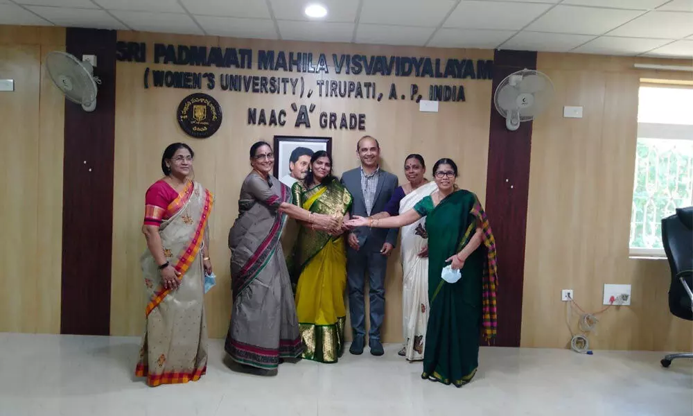 SPMVV V-C Prof D Jamuna along with other varsity officials felicitating Meenakshi Anipindi of Suswara Academy, USA during their recent visit to SPMVV in Tirupati.