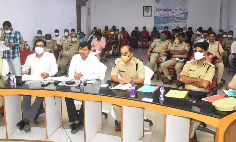 District Collector A Mallikarjuna and other officials at a virtual conference held at the Collectorate in Visakhapatnam on Friday