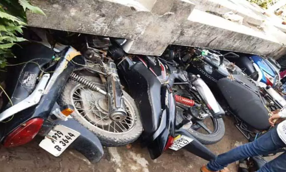 50 parked bikes at Shiva Ganga theatre in Dilsukhnagar in Hyderabad damaged as wall collapses