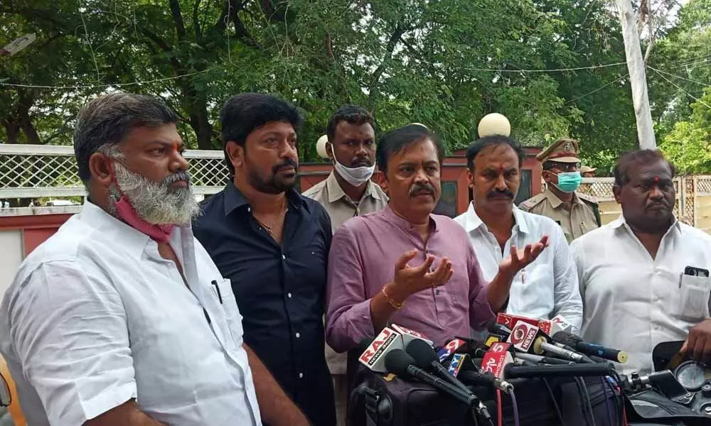 Rajya Sabha member GVL Narasimha Rao addressing the media at the Collectors camp office in Guntur on Saturday