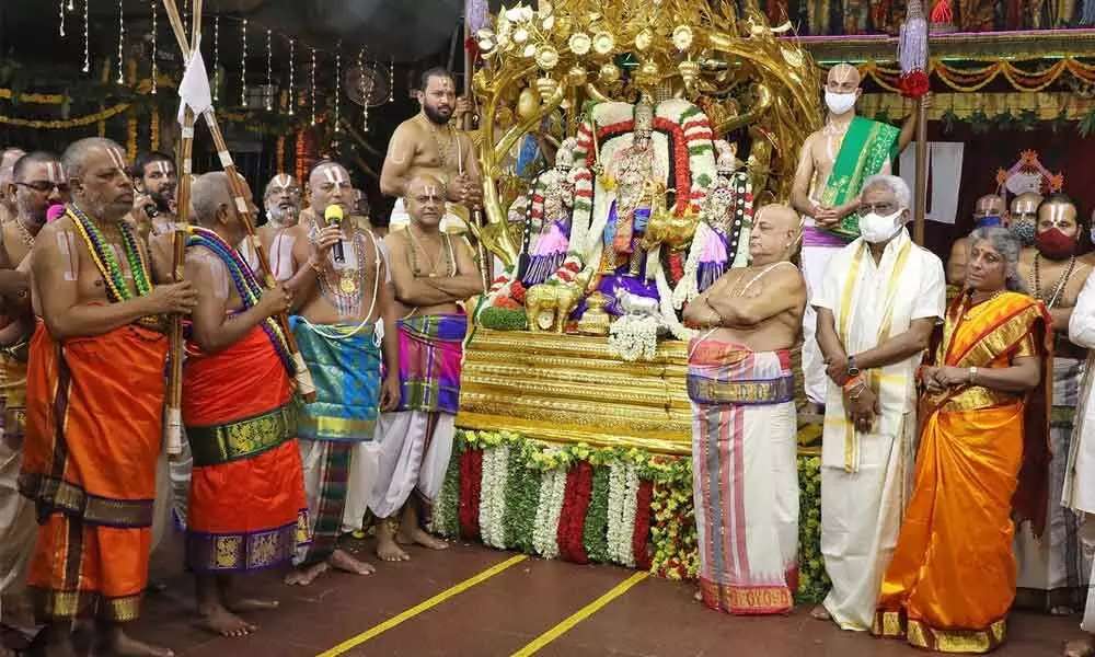 Lord Malayappa along with His consorts atop Kalpavruksha Vahanam at Tirumala on Sunday