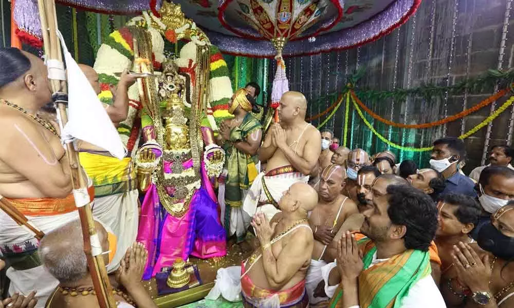 Chief Minister Y S Jagan Mohan Reddy offering prayers to the Lord and taking part in Garuda Vahana Seva at Tirumala on Monday