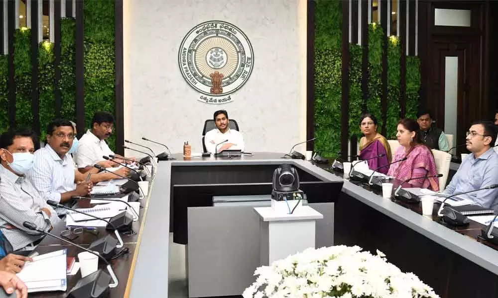 Chief Minister Y S Jagan Mohan Reddy holding a review meeting on education at his camp office in Tadepalli on Monday
