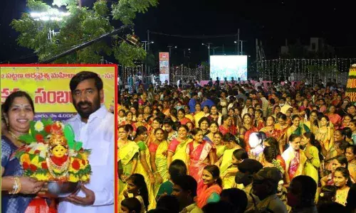 Minister Jagadish Reddy addressing the women during the Bathukamma festival celebrations held at the Saddala Cheruvu in Suryapet on Sunday