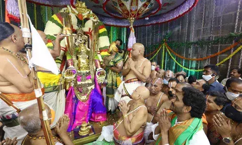 Chief Minister Y S Jagan Mohan Reddy offering prayers to the Lord and taking part in Garuda Vahana Seva at Tirumala on Monday