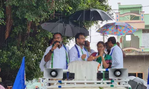 Kadapa Mayor K Suresh Babu participating in election campaign in Kasinayina mandal on Monday.