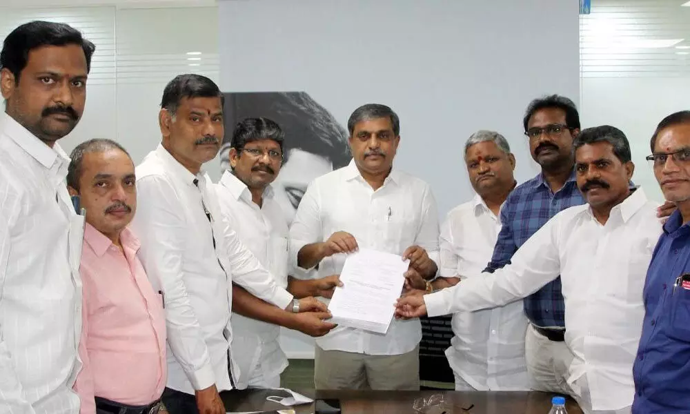 AP JAC and APJAC Amaravati leaders submit a representation to the advisor to the state government Sajjala Ramakrishna Reddy in Vijayawada on Tuesday