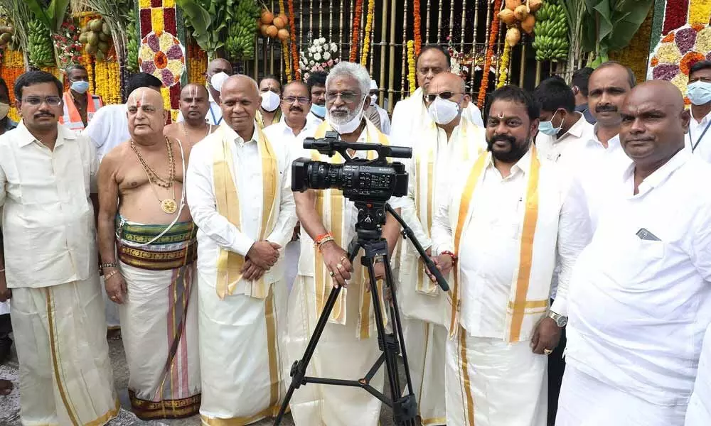 Former MLC from Karnataka Dr TA Saravana handing over cameras to TTD chairman Y V Subba Reddy at Tirumala on Tuesday. TTD EO K S Jawahar Reddy and Additional EO A V Dharma Reddy are also seen.