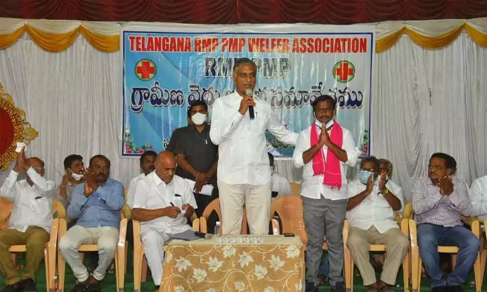 Minister T Harish Rao addressing an election meeting at Penchikalpet in Huzurabad assembly constituency on Tuesday