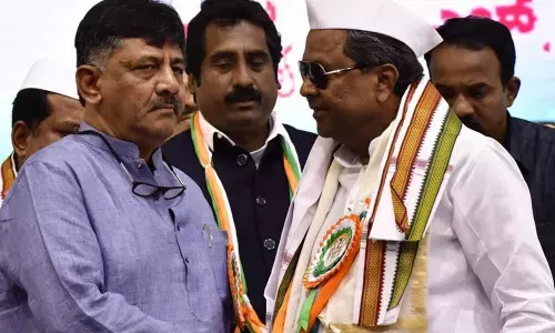 DK Shivakumar and VS Ugrappa