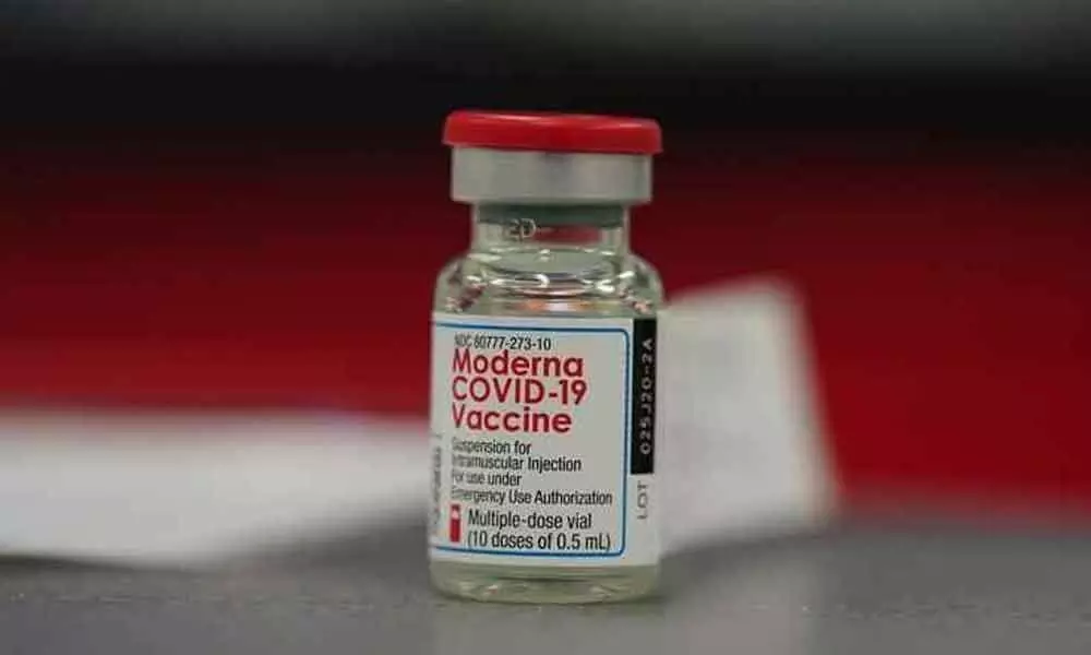 US FDA backs half-dose Moderna booster for at-risk adults