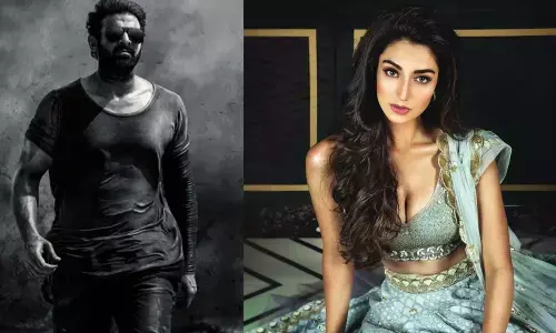 Meenakshi Chowdarys special song for Prabhas!