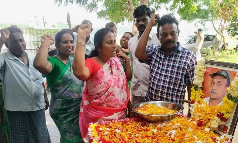 Wife Sirisha and others pay tributes Maoist leader Akkiraju Haragopal alias RK at Alakurapadu village in Prakasam district on Saturday