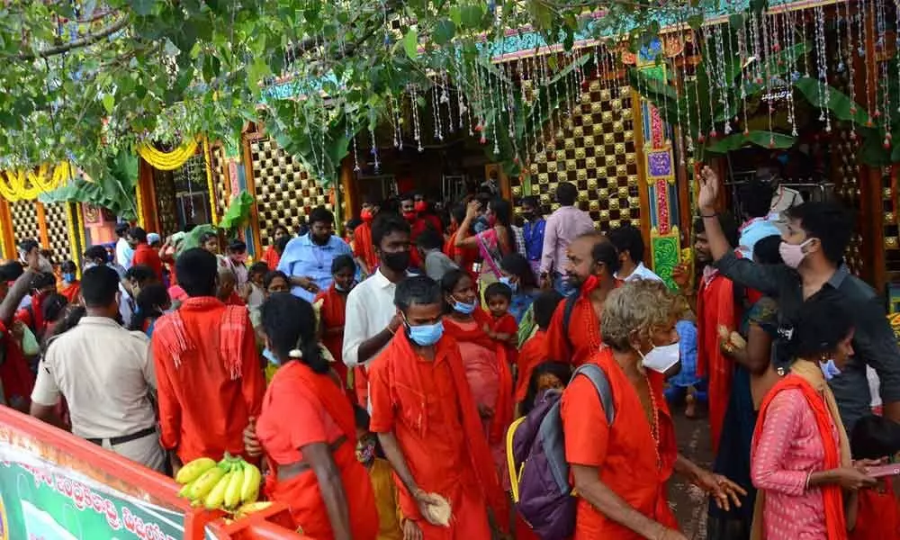 Bhavani devotees at Kanaka Durga temple on Indrakeeladri on Saturday.
