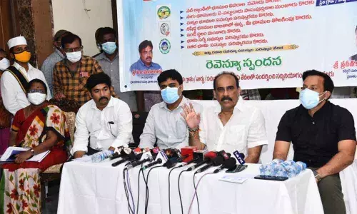Minister Balineni Srinivasa Reddy addressing   a meeting in Ongole on Saturday