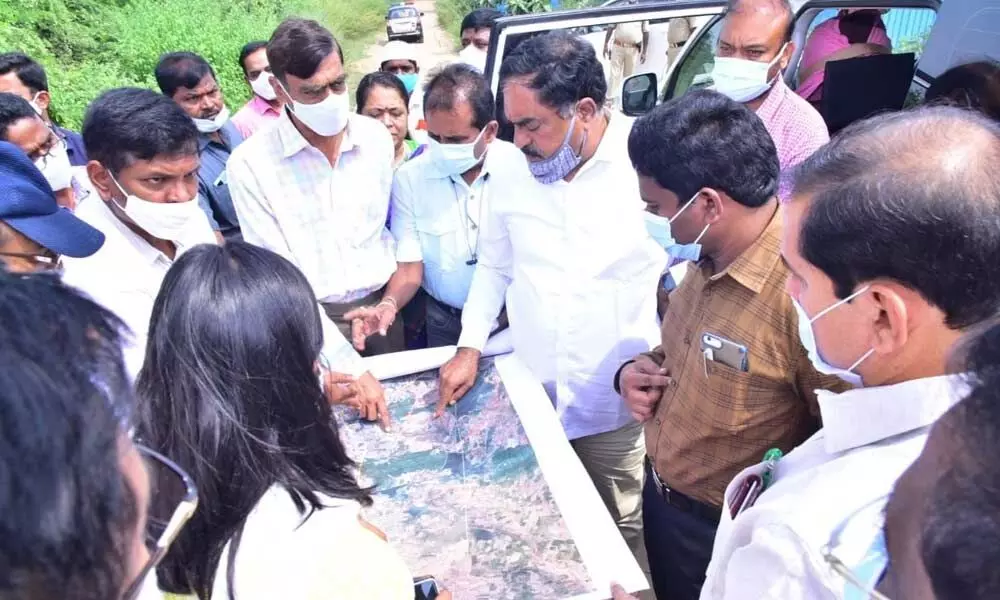 Minister for Panchayat Raj Errabelli Dayakar Rao and Chief Whip D Vinay Bhaskar at the site of TRS meeting in Warangal on Tuesday
