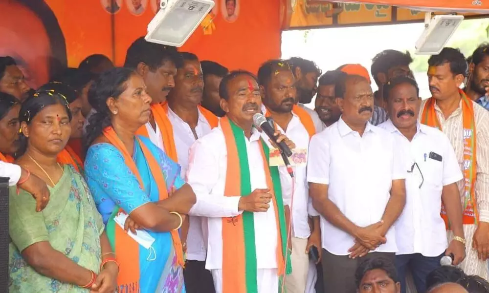 BJP candidate Eatala Rajender addressing an election campaign in Shalapally village in Huzurabad mandal on Tuesday