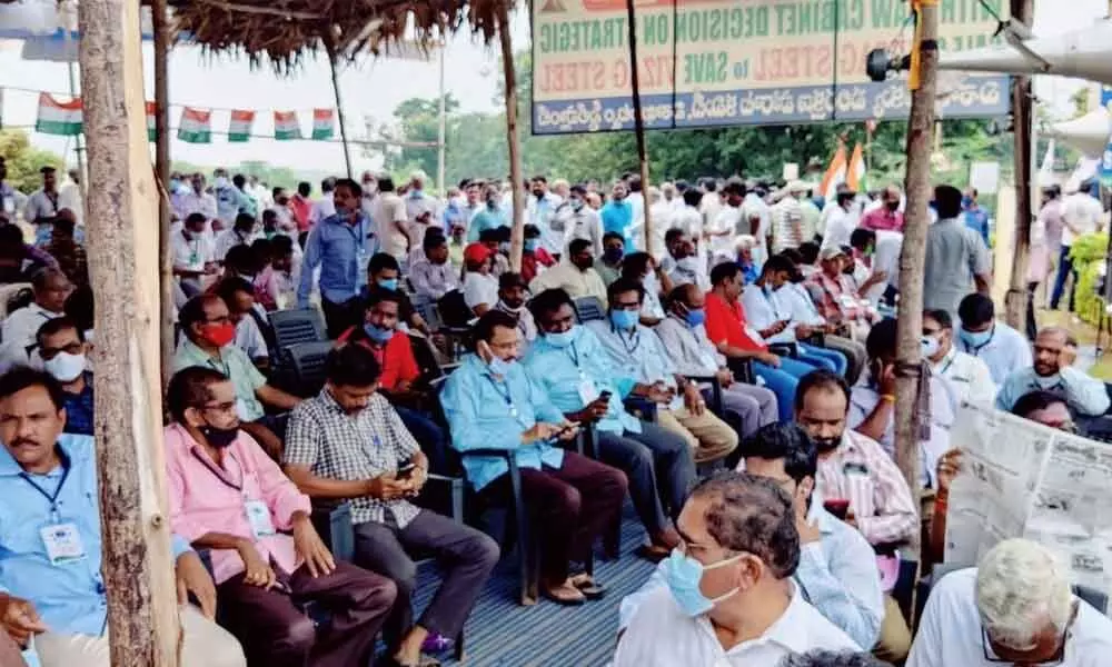 Representatives of Visakha Ukku Parirakshana Porata Committee and employees participating in a 25-hour- long relay hunger strike in Visakhapatnam on Tuesday