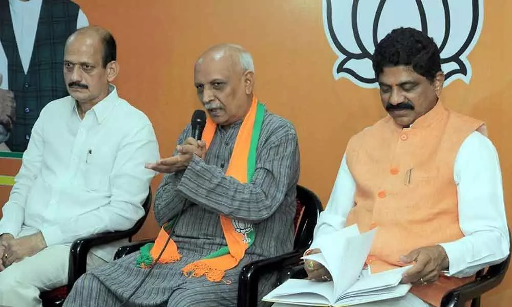 Former chief secretary and BJP leader I Y R Krishna Rao along with party leaders addresses a press conference at BJP state office in Vijayawada on Tuesday	 ( Hans photo: Ch Venkata Mastan)
