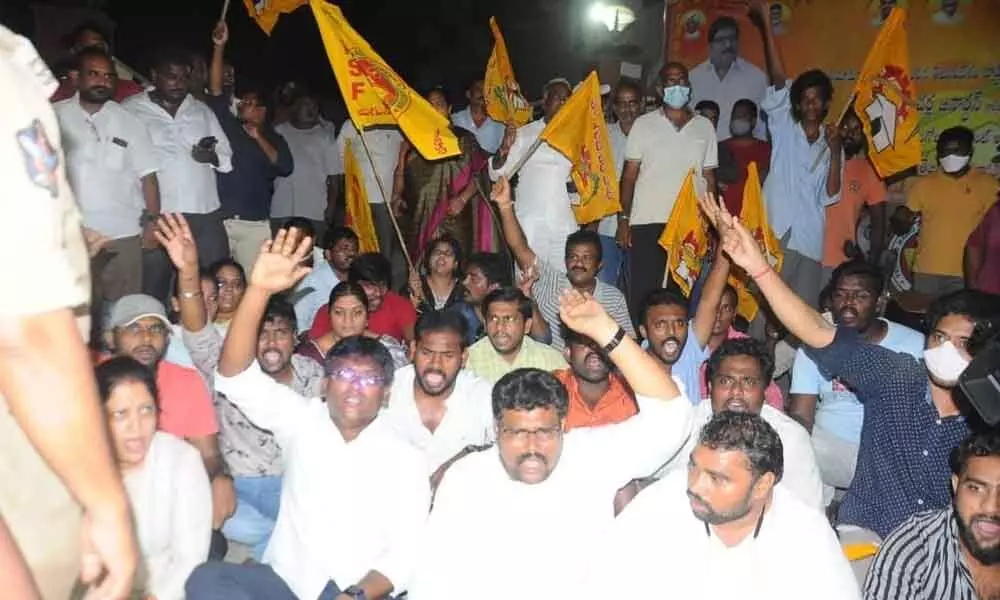 TDP leaders and workers protesting at NTR Bhavan in Ongole on Tuesday evening
