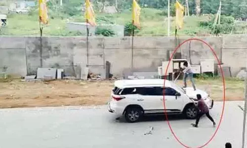 YSRCP activists attack a car parked at TDP state office in Mangalagiri on Tuesday