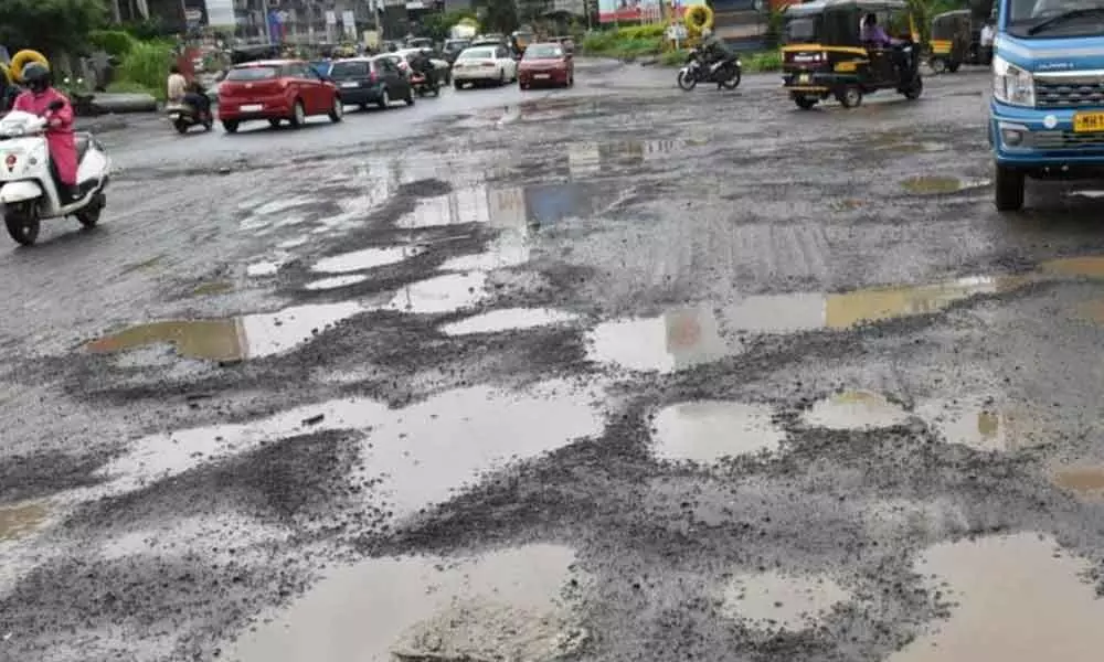 AAP threatens to move court if govt fails to repair pothole-riddled roads