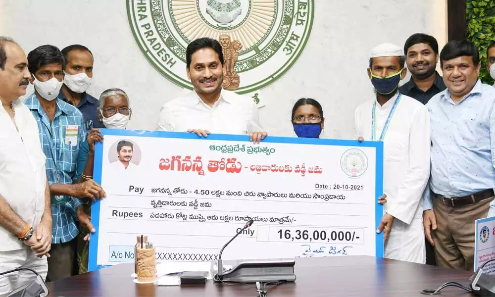 Chief Minister Y S Jagan Mohan Reddy releases interest reimburement amount to beneficiaries under Jagananna Thodu scheme at his camp office on Wednesday