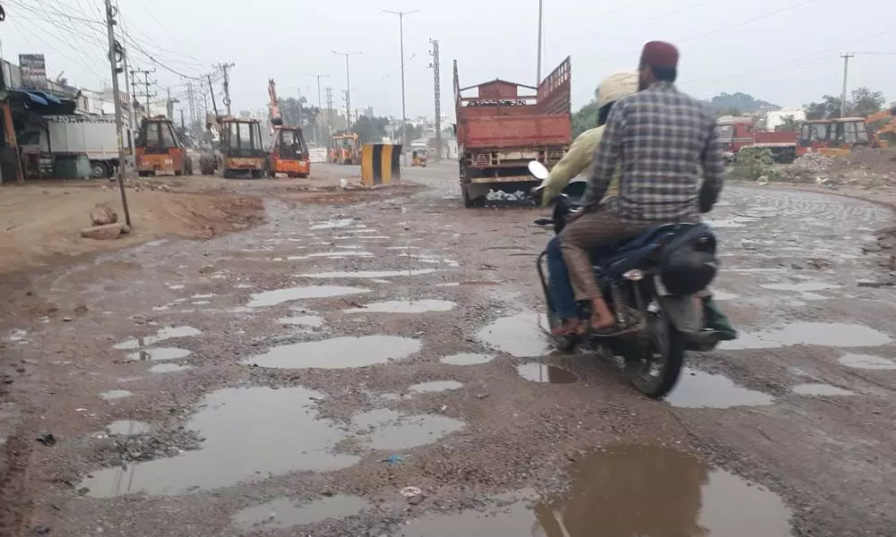Pothole-ridden road makes commuting a nightmare
