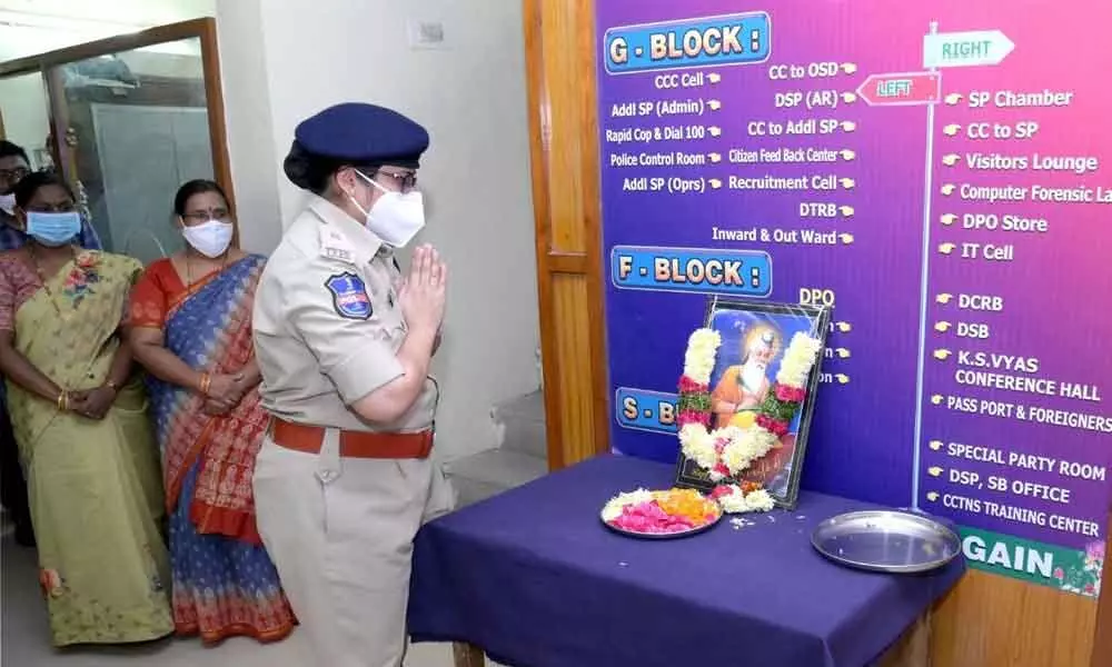 Additional SP Narmada paying tributes to the picture of  Valmiki in Nalgonda on Wednesday