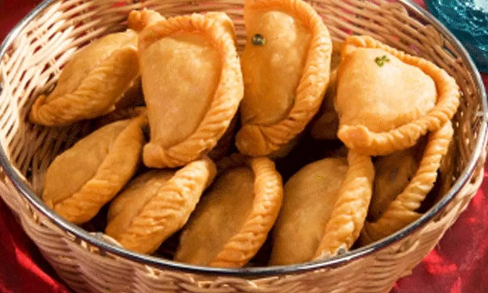 Gujiyas are sweet dumpling, they are made using Maida