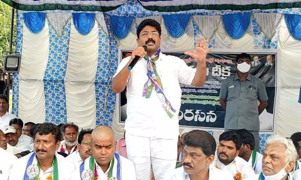 Education Minister Dr Audimulapu Suresh speaking at Janagraha Deeksha in Yerragondapalem on Friday