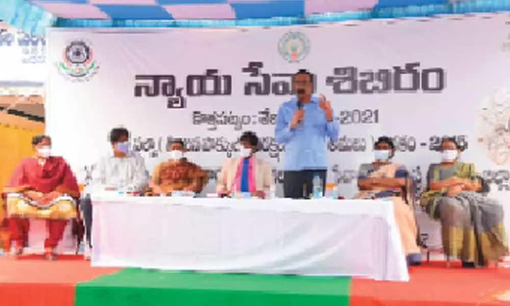 First additional district judge R Sivakumar speaking at the Legal Service Camp on NALSA in  Kothapatnam on Saturday