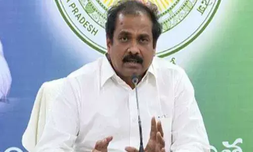 Agriculture Minister  K Kannababu addressing a press conference at YSRCP central office in Tadepalli on Saturday
