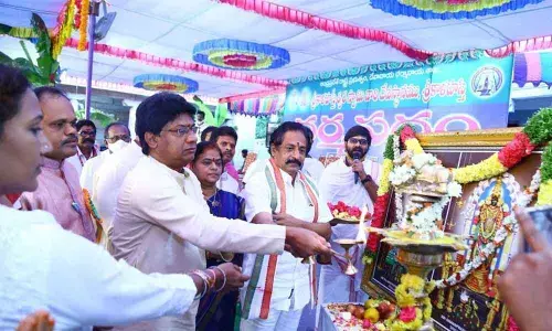 Srikalahasti temple EO D Peddiraju and others performing puja at Dharma Patham programme on Saturday