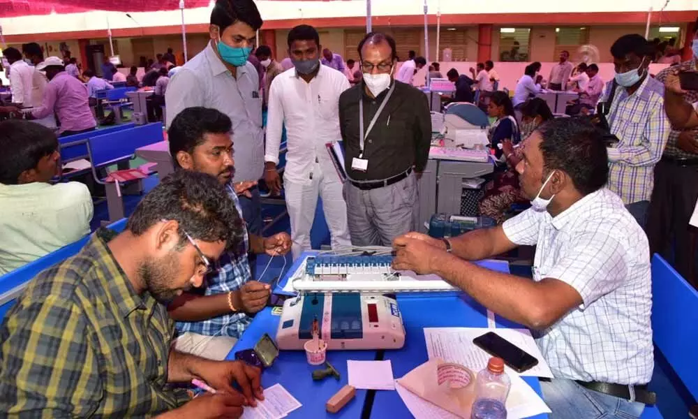 Election Observer Bhisma Kumar inspecting the functioning of EVMs in Badvel on Sunday