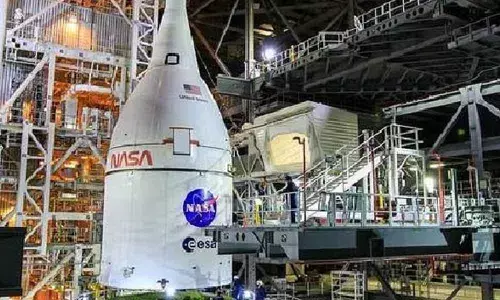 NASA completes stacking rocket for Moon mission