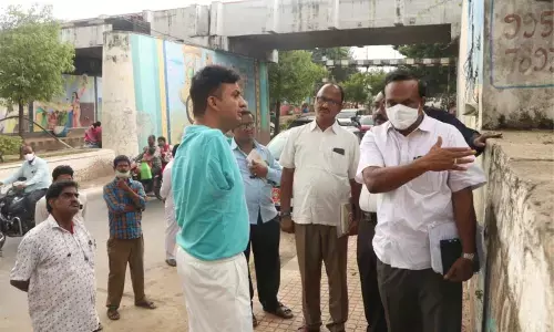 Commissioner P S Girisha along with engineering officials inspecting RuB near SVU Campus School, where a Karnataka pilgrim died in recent floods, in Tirupati on Sunday Commissioner P S Girisha along with engineering officials inspecting RuB near SVU Campus School, where a Karnataka pilgrim died in recent floods, in Tirupati on Sunday